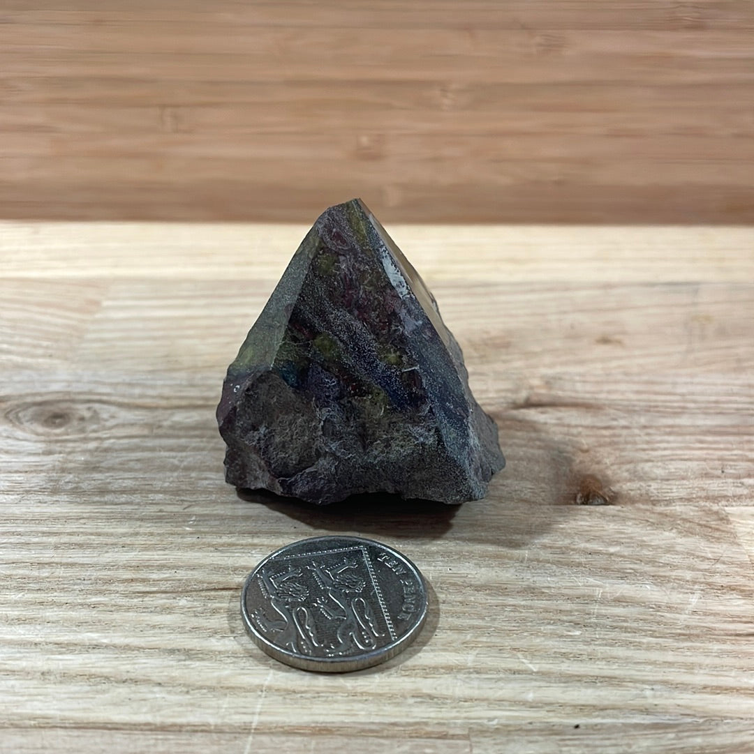 Dragons Blood Raw with cut and polished point