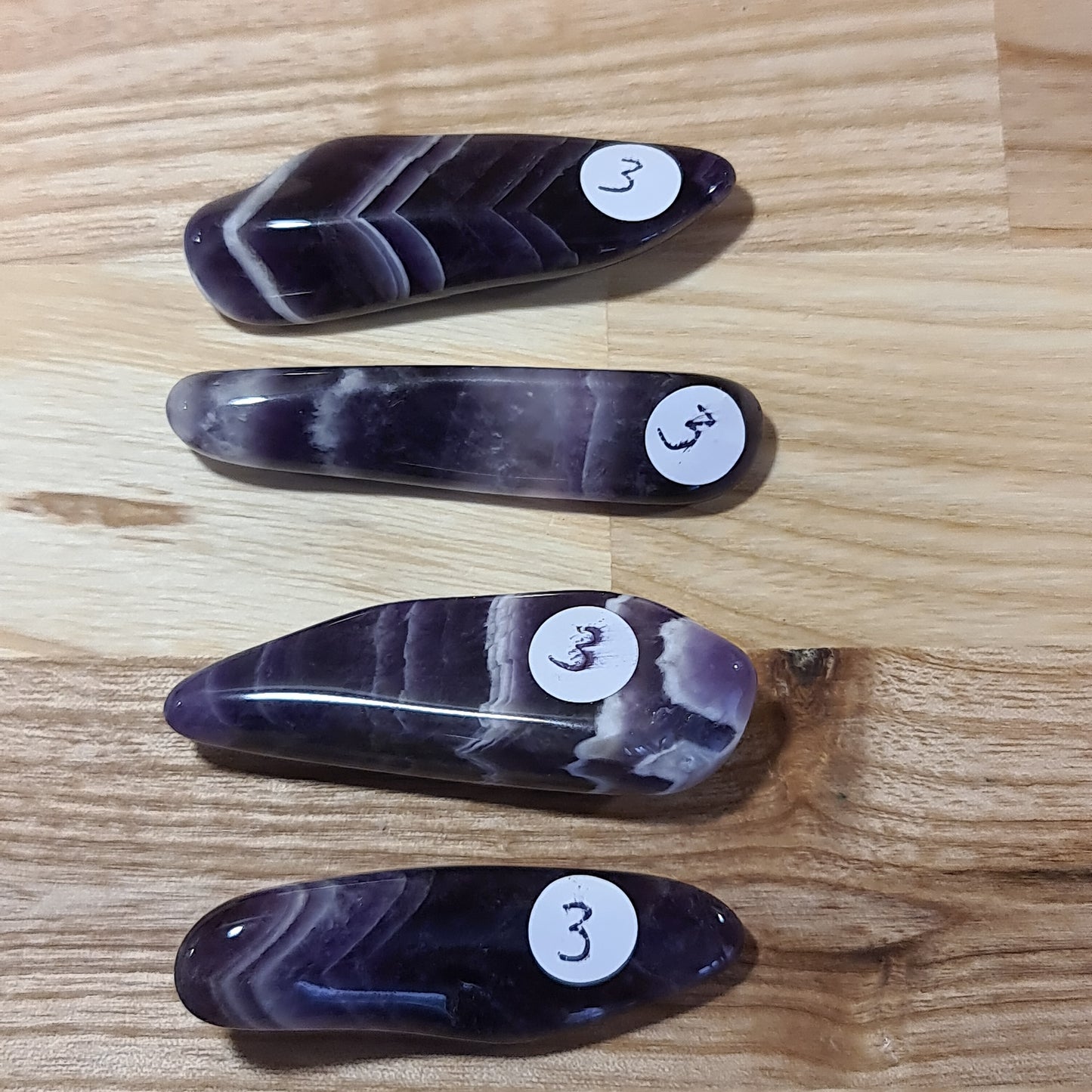 Chevron Amethyst polished pebbles - A Grade