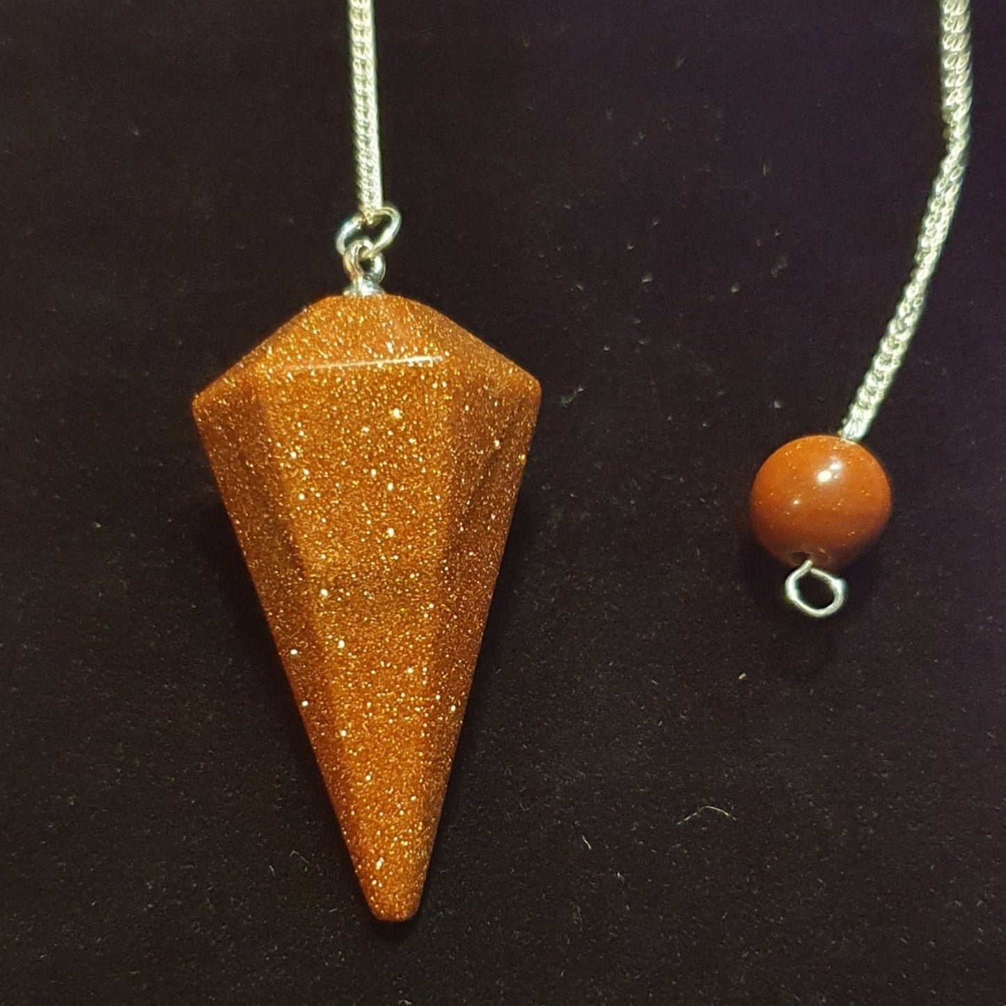 Goldstone Faceted Pendulum
