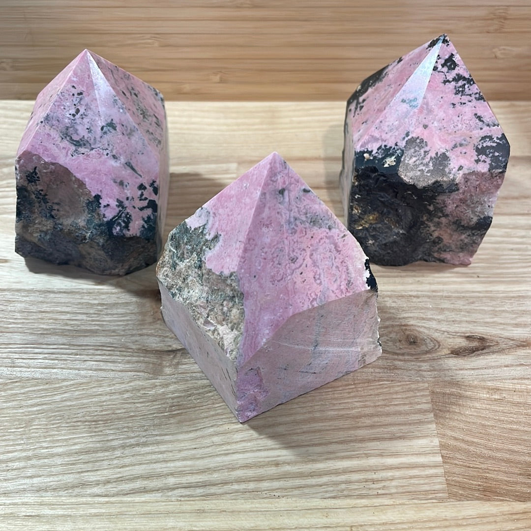 Rhodonite Raw with cut and polished point