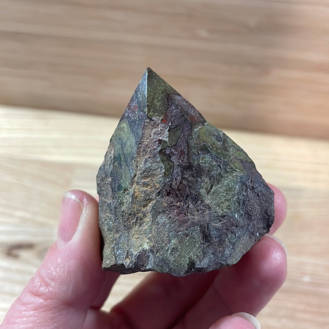 Dragons Blood Raw with cut and polished point