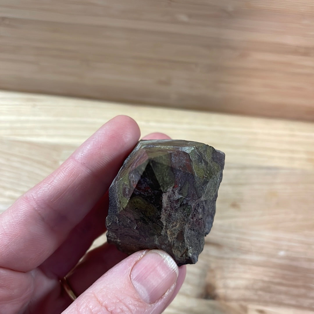 Dragons Blood Raw with cut and polished point