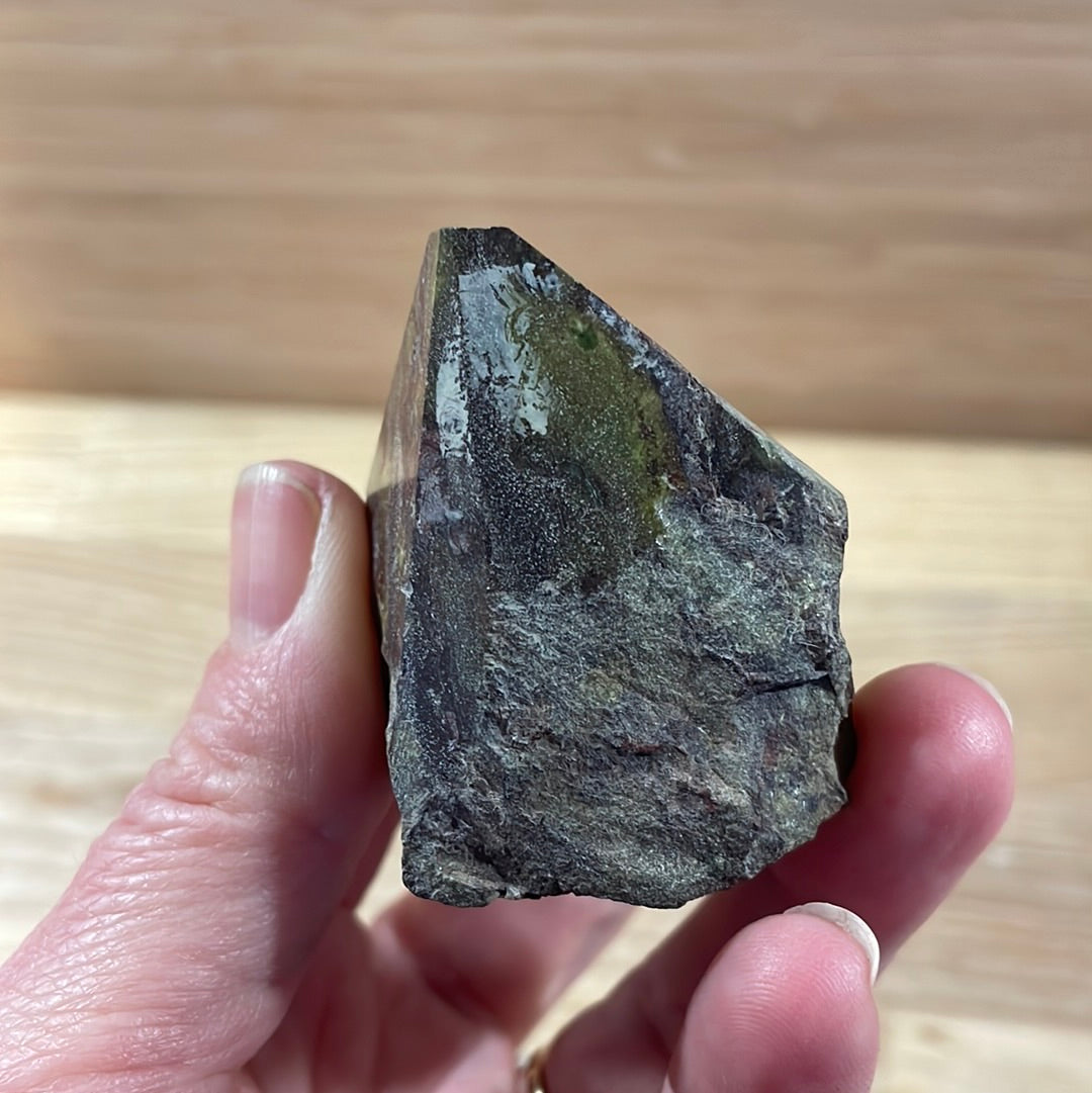 Dragons Blood Raw with cut and polished point