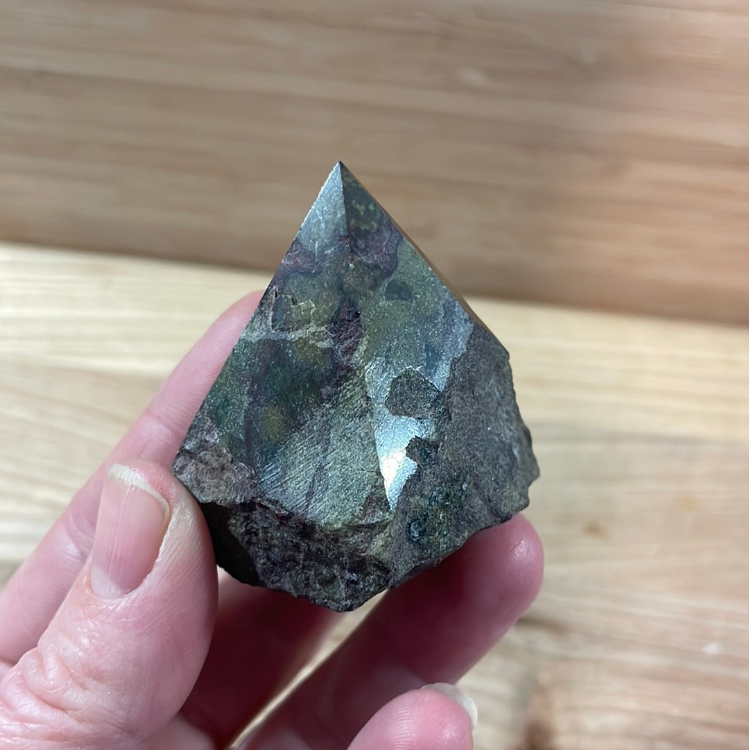 Dragons Blood Raw with cut and polished point