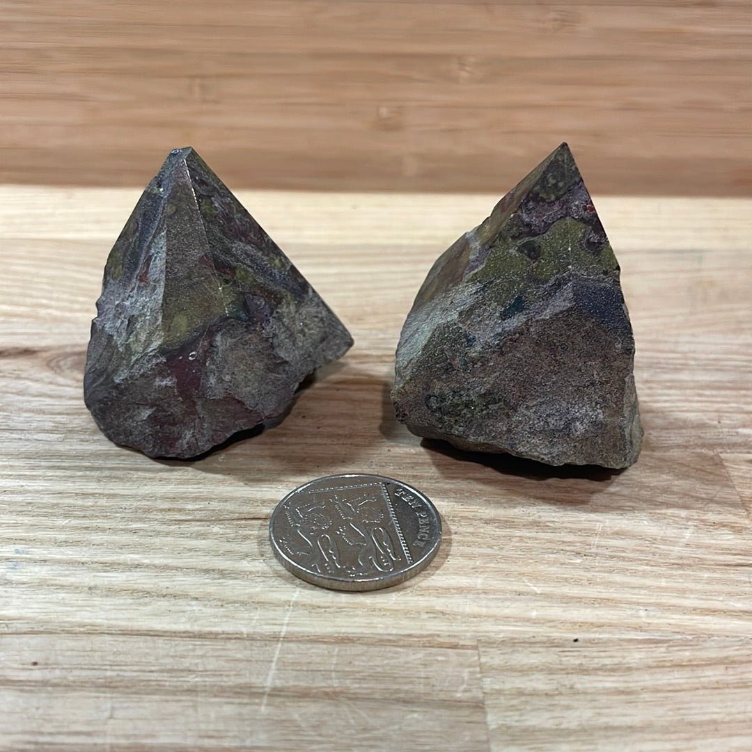 Dragons Blood Raw with cut and polished point