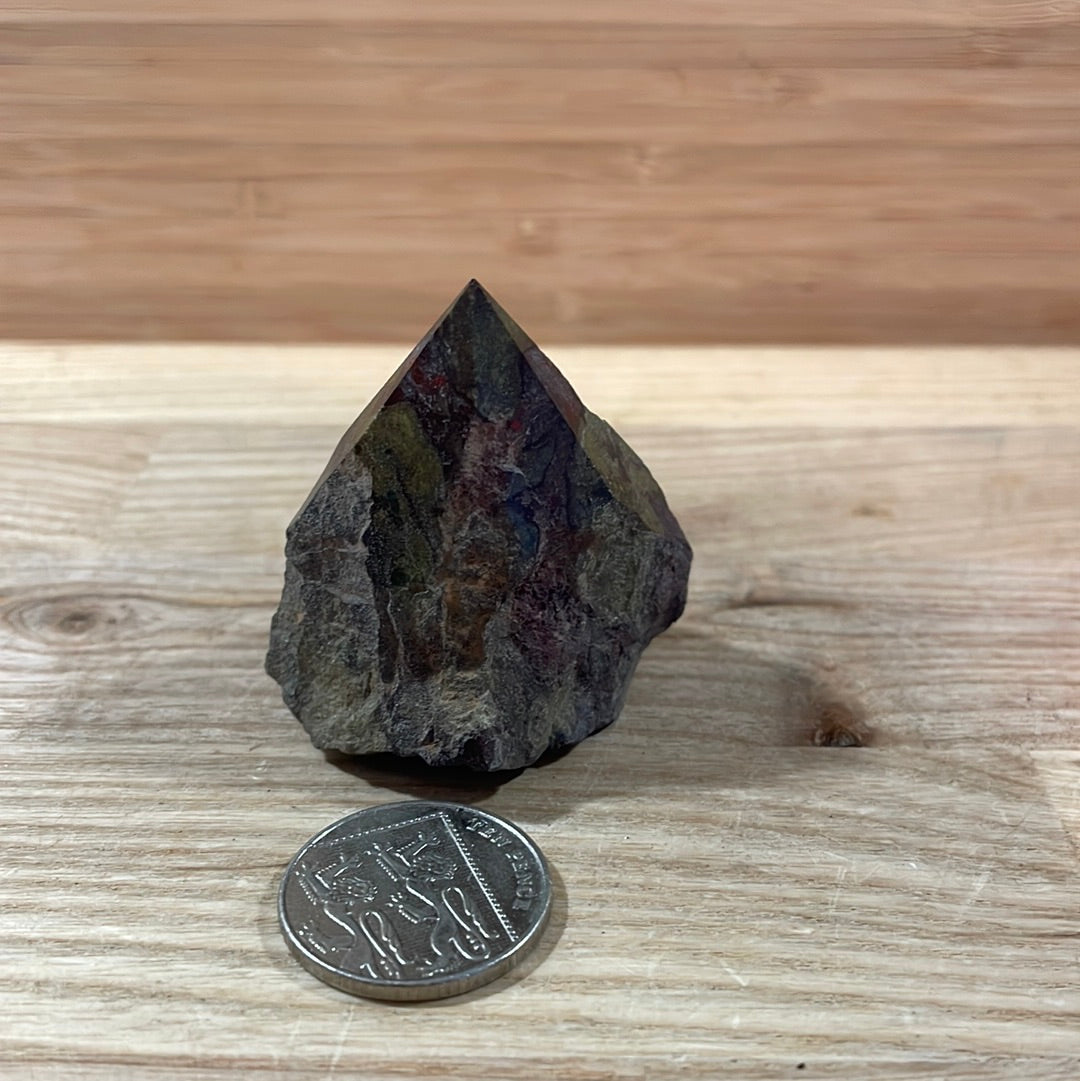 Dragons Blood Raw with cut and polished point
