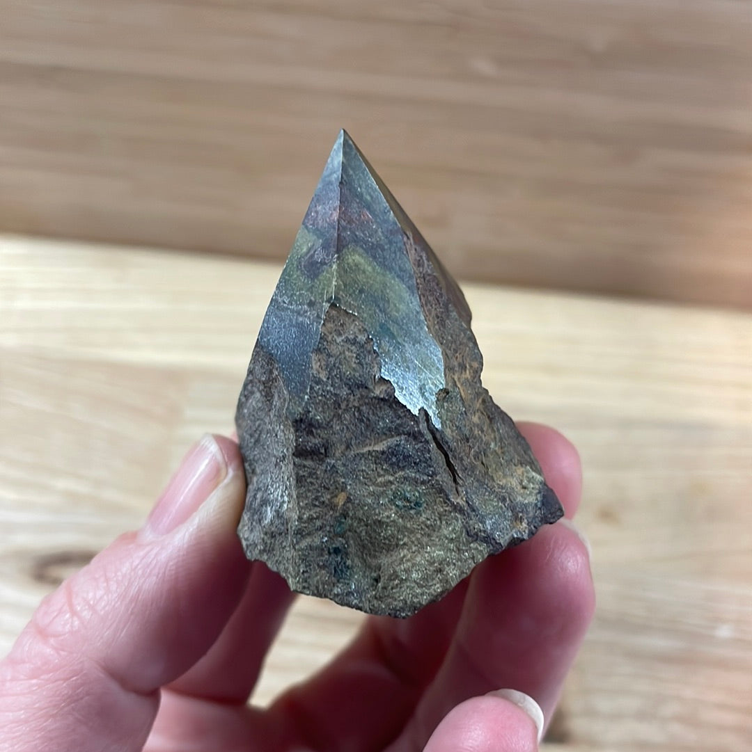 Dragons Blood Raw with cut and polished point