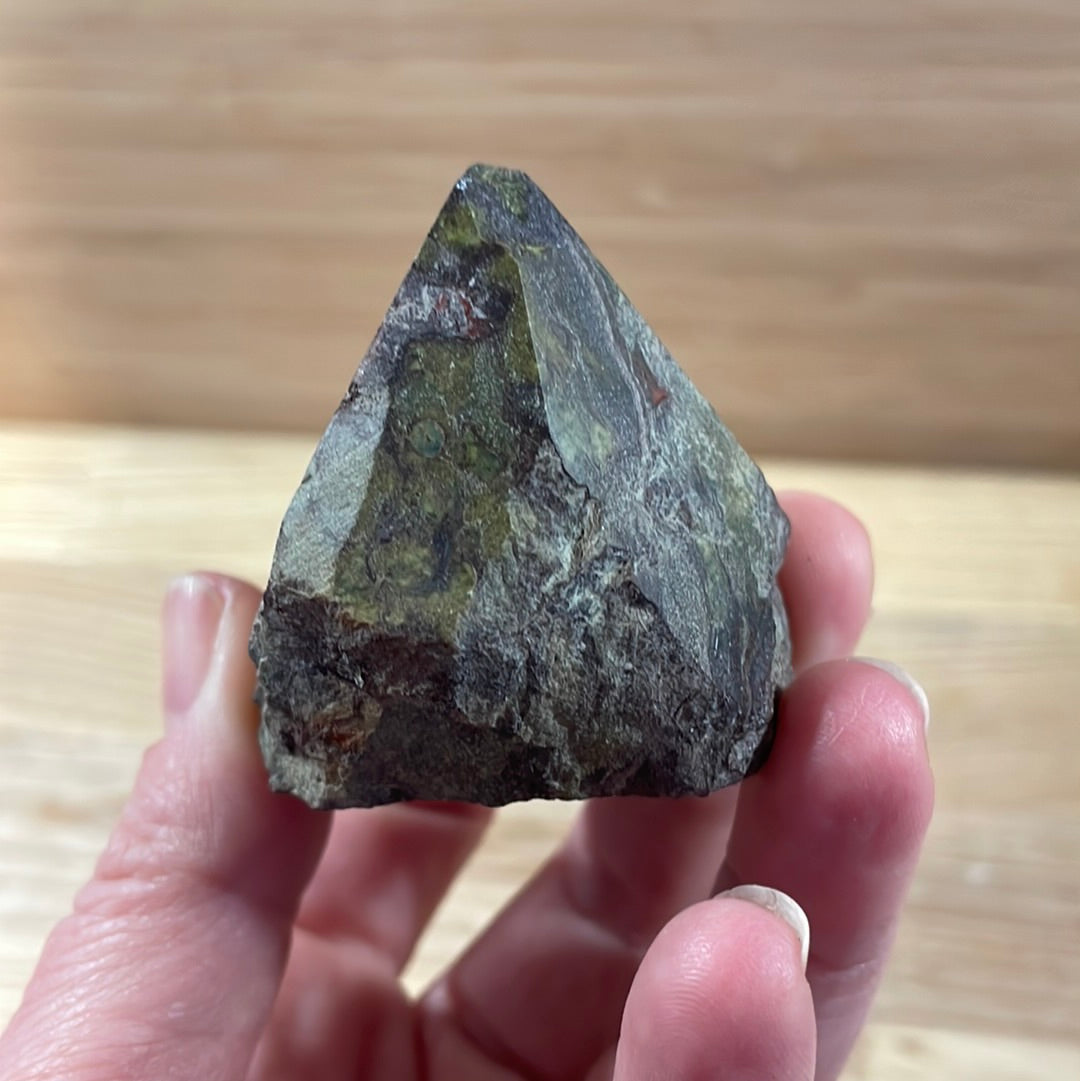 Dragons Blood Raw with cut and polished point