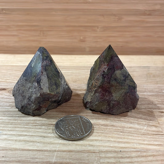 Dragons Blood Raw with cut and polished point