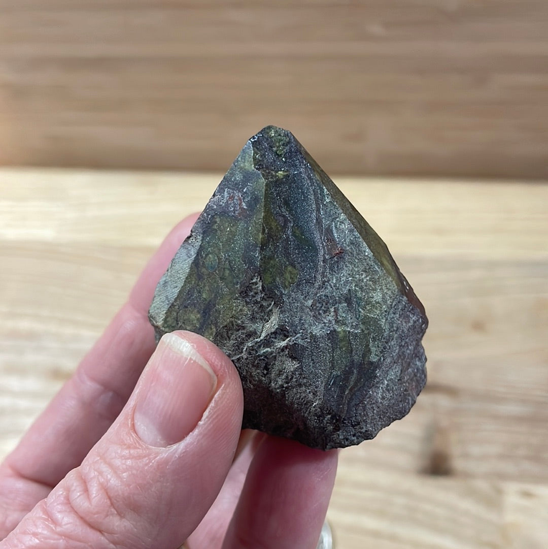 Dragons Blood Raw with cut and polished point