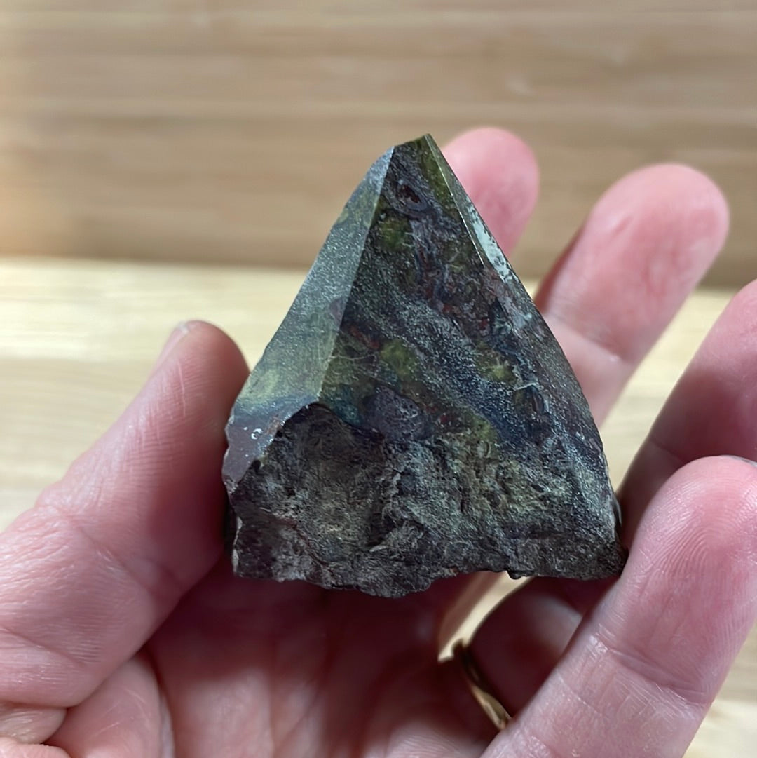 Dragons Blood Raw with cut and polished point