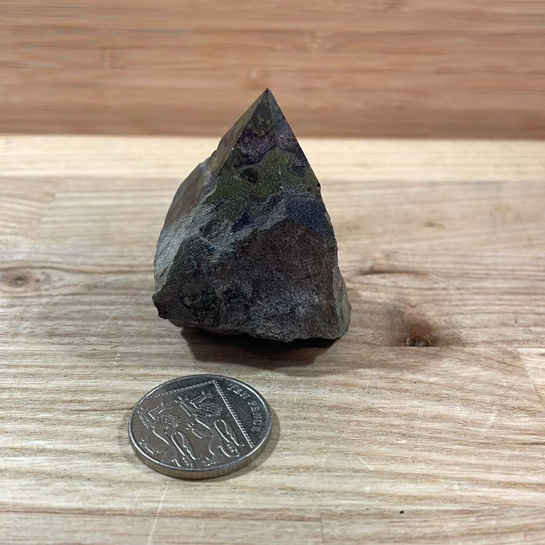 Dragons Blood Raw with cut and polished point