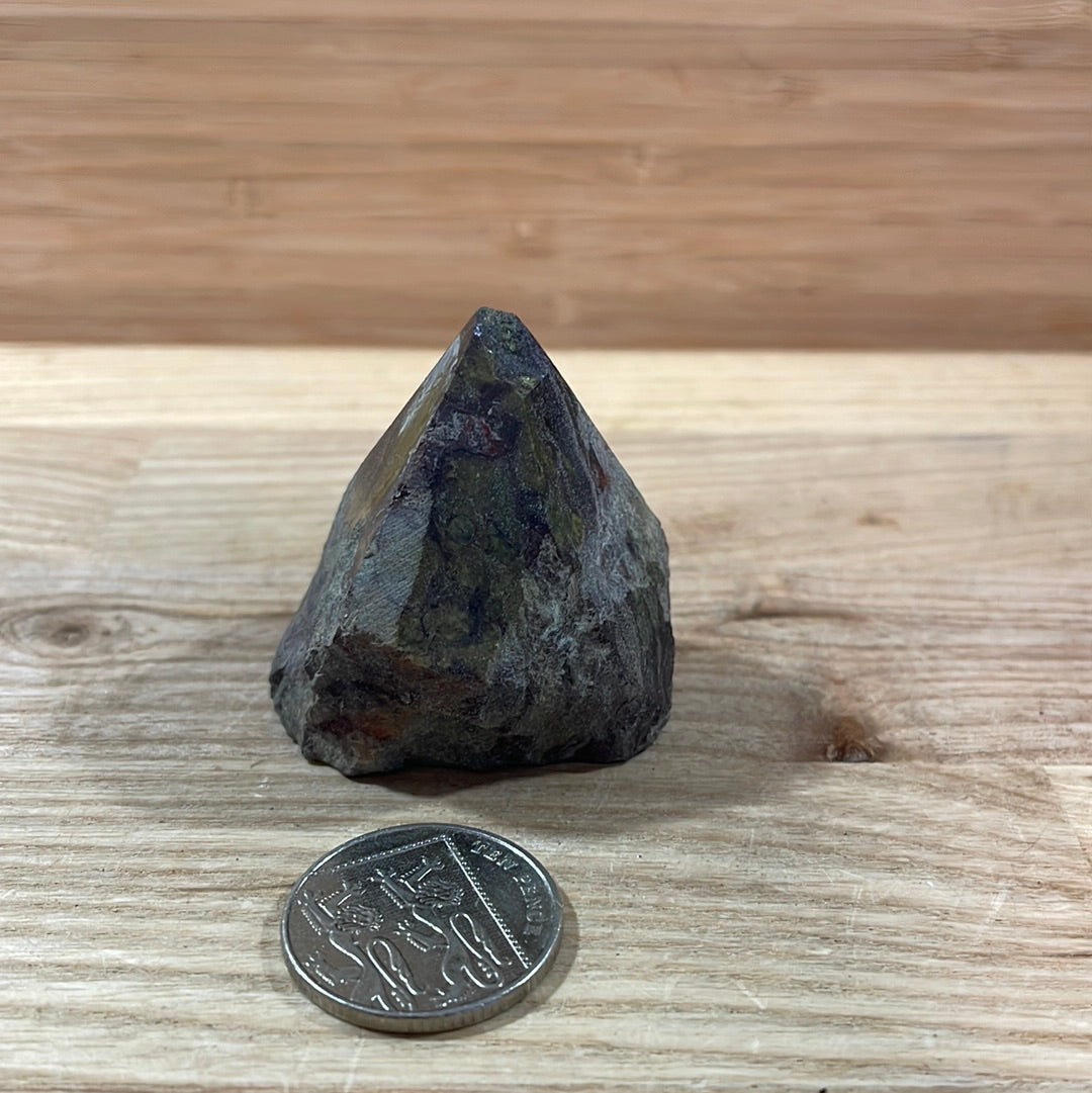Dragons Blood Raw with cut and polished point
