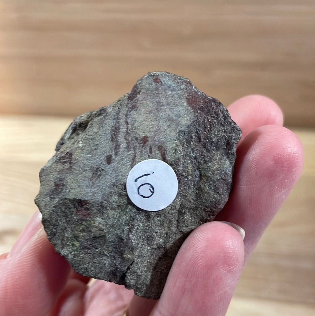 Dragons Blood Raw with cut and polished point