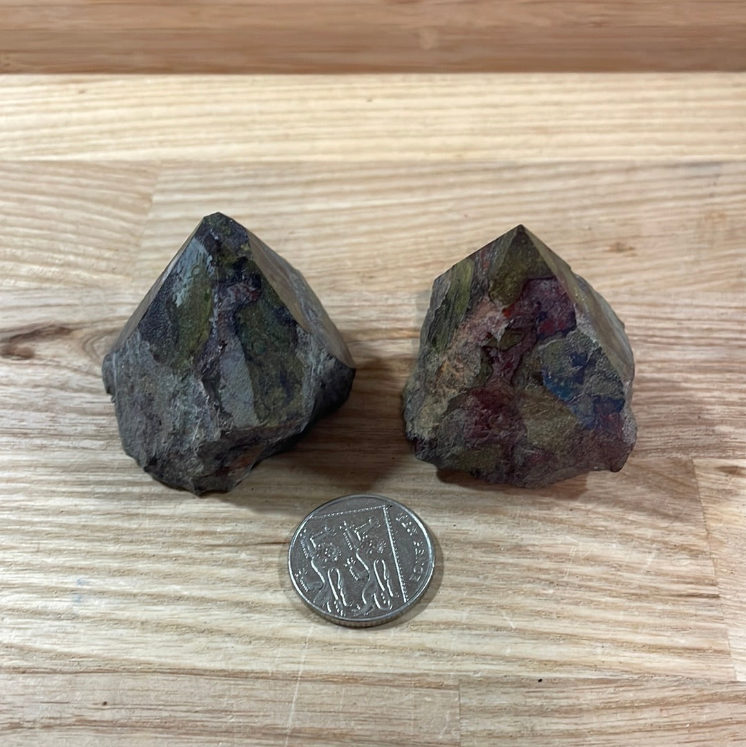 Dragons Blood Raw with cut and polished point