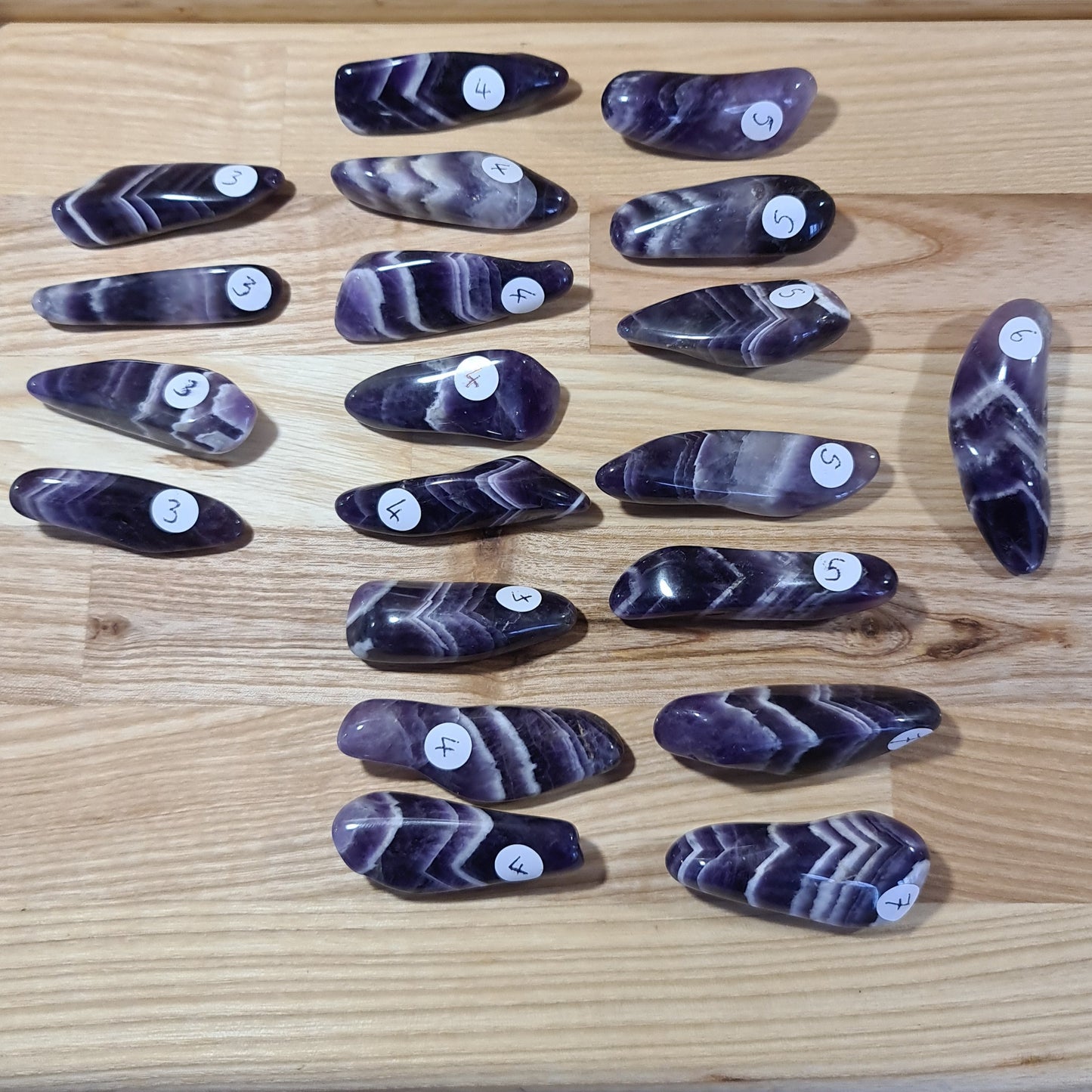 Chevron Amethyst polished pebbles - A Grade