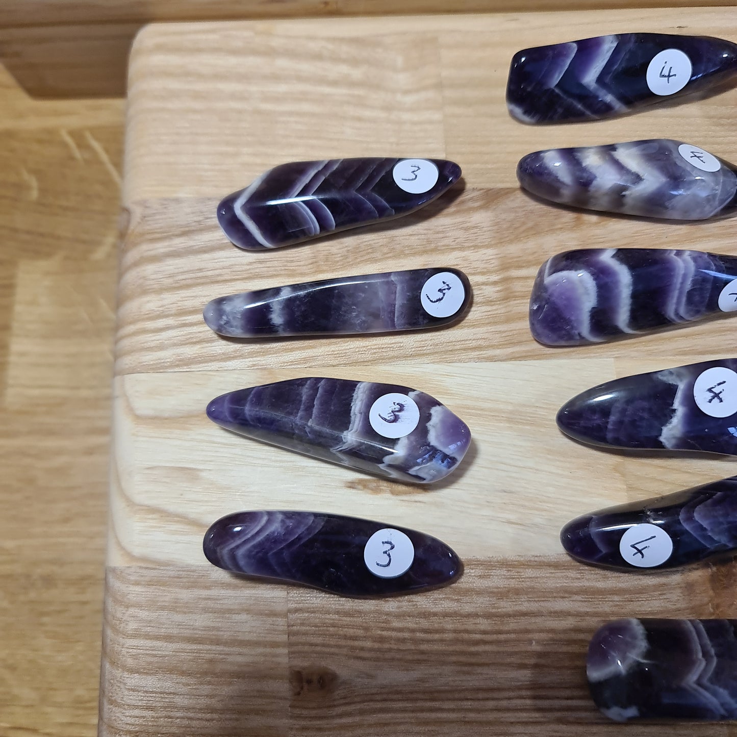 Chevron Amethyst polished pebbles - A Grade