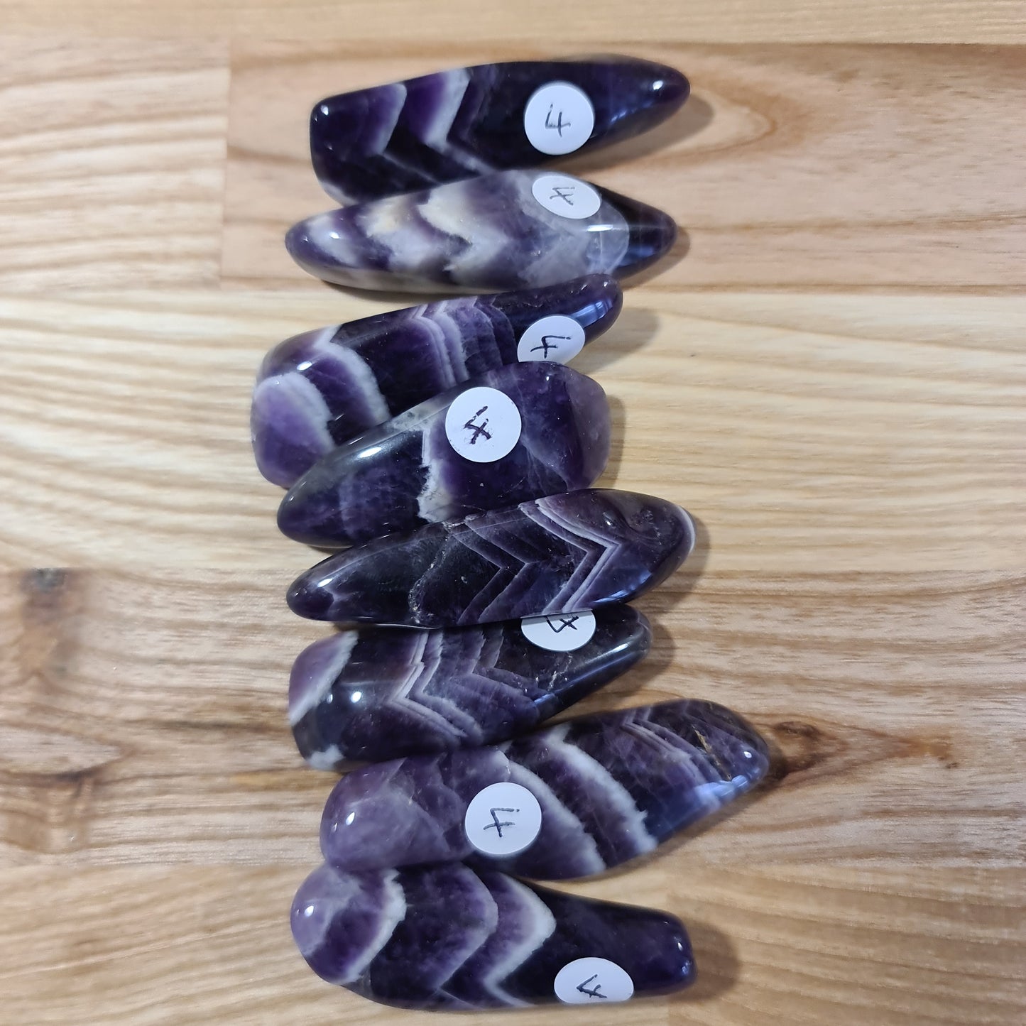 Chevron Amethyst polished pebbles - A Grade