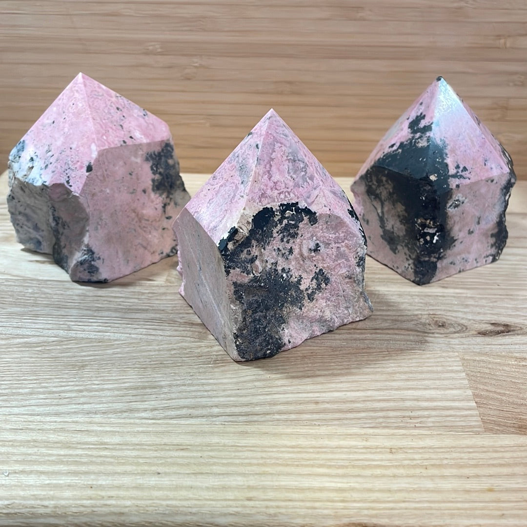Rhodonite Raw with cut and polished point