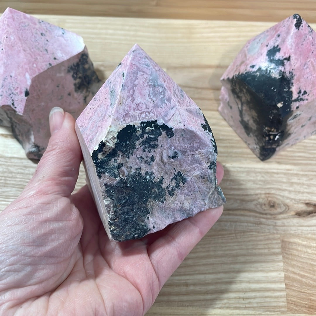 Rhodonite Raw with cut and polished point